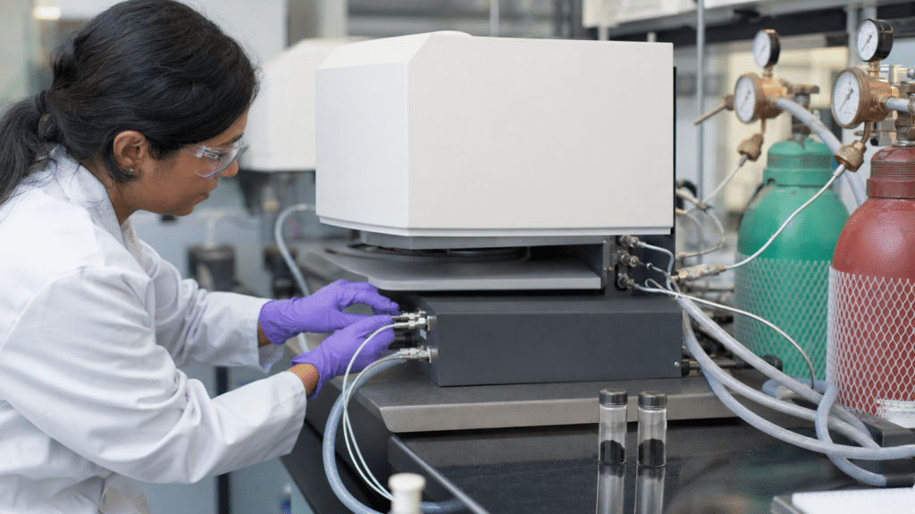 C60 TGA and DSC: How to Interpret Fullerene Thermal Analysis 11 Scientist checking gas connections for controlled-atmosphere C60 thermal analysis